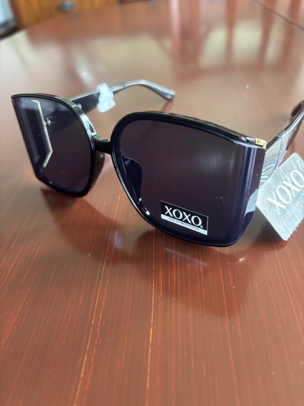 XOXO  100% UV protection,black frame,black lens,Goldtone accent